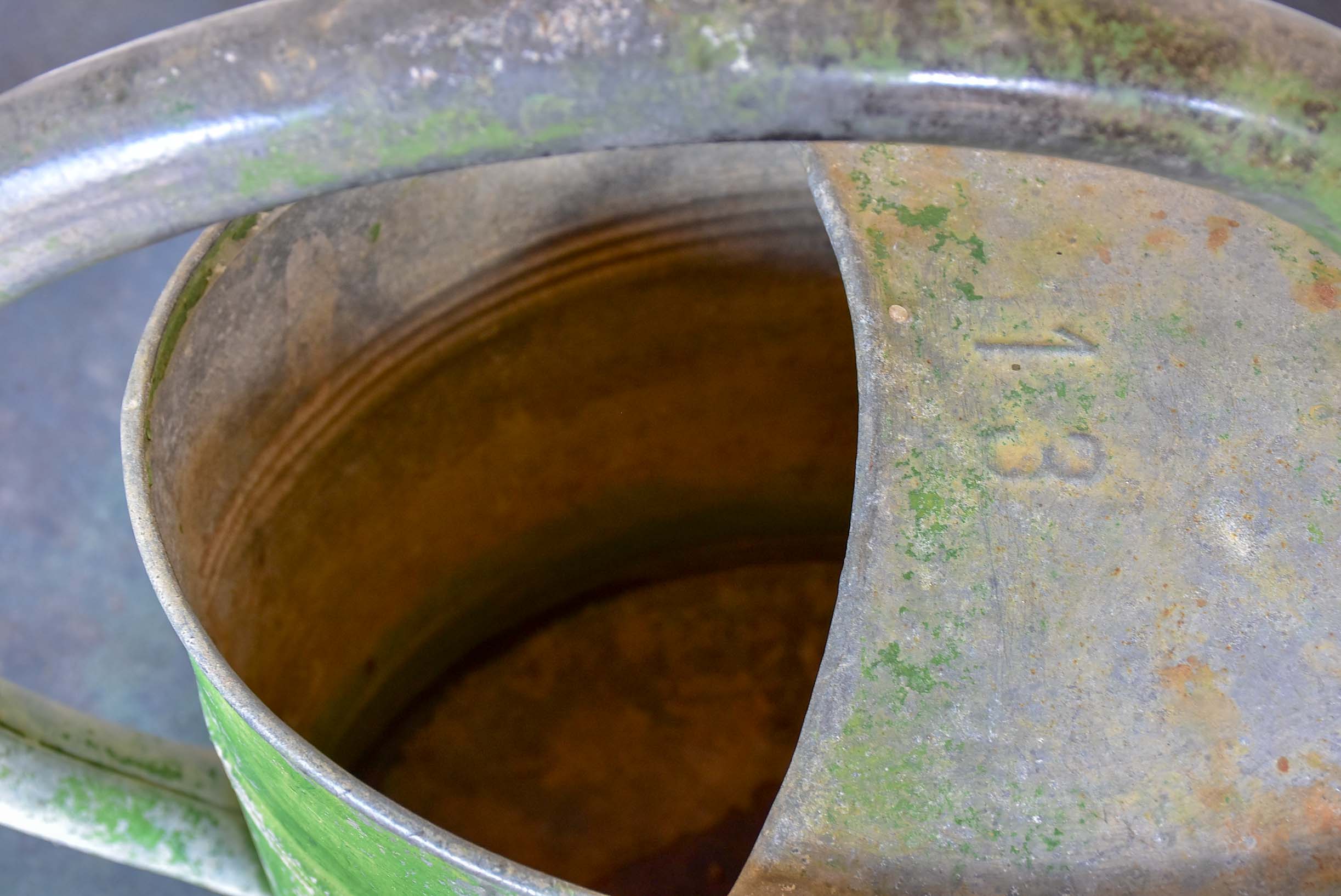 Early 20th Century watering can with green patina