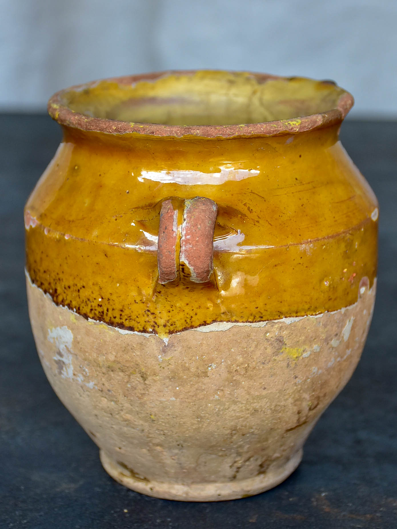 Very small antique French confit pot with yellow glaze 5”