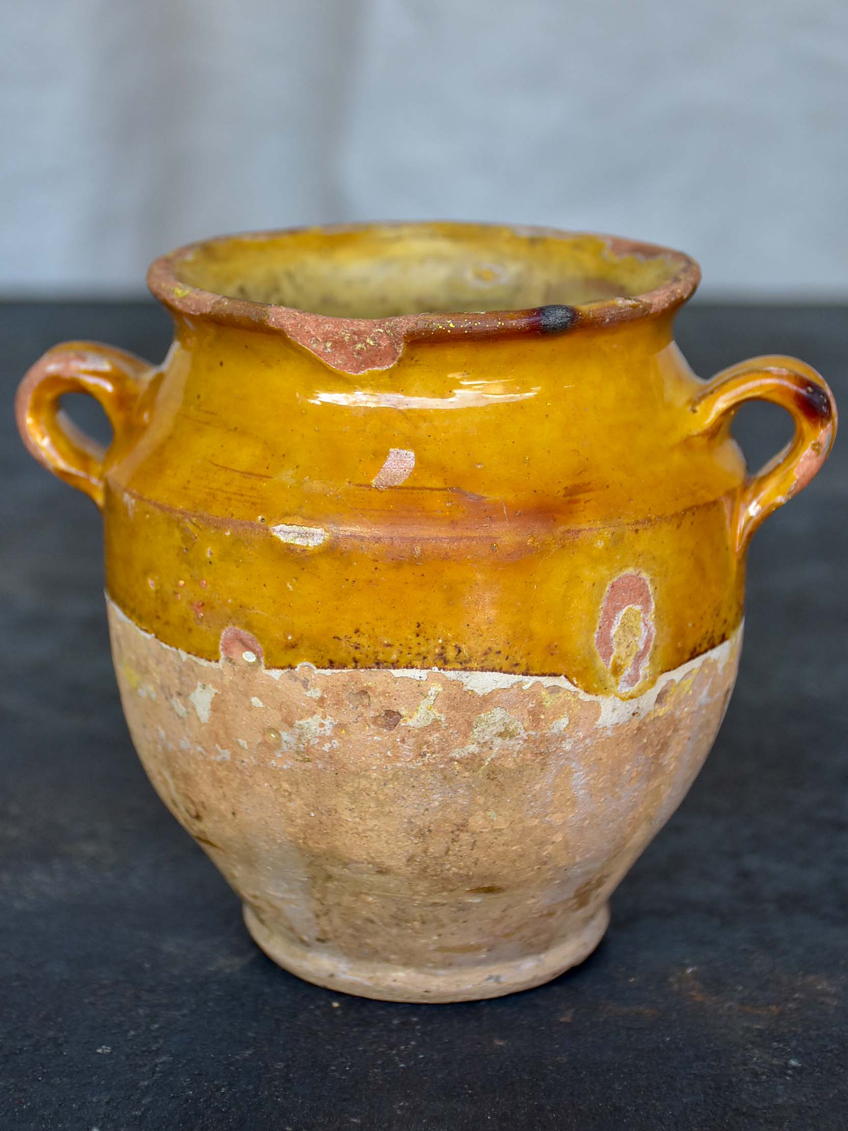 Very small antique French confit pot with yellow glaze 5”