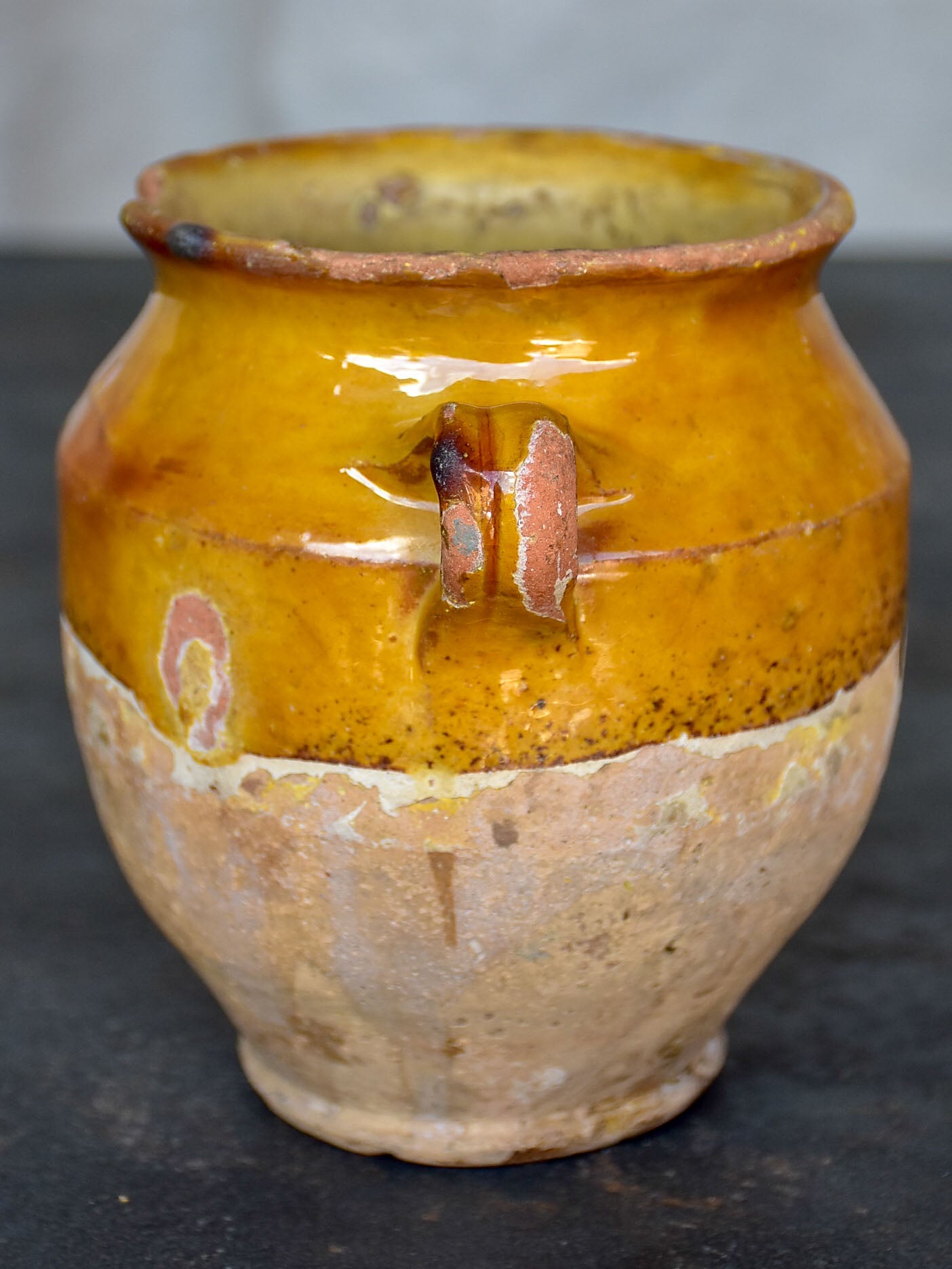 Very small antique French confit pot with yellow glaze 5”