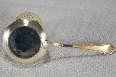 English tea strainer from the 1930's - silver plate