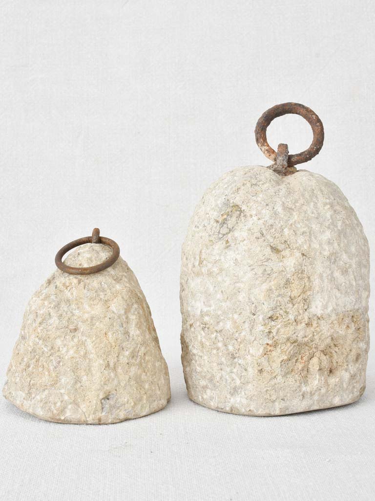 Two antique stone counterweights 6¼"