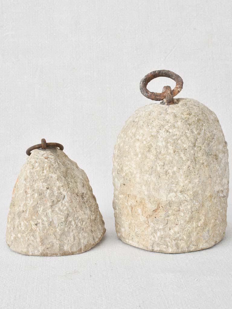 Two antique stone counterweights 6¼"