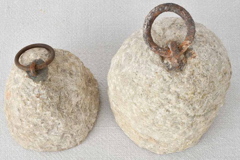 Two antique stone counterweights 6¼"