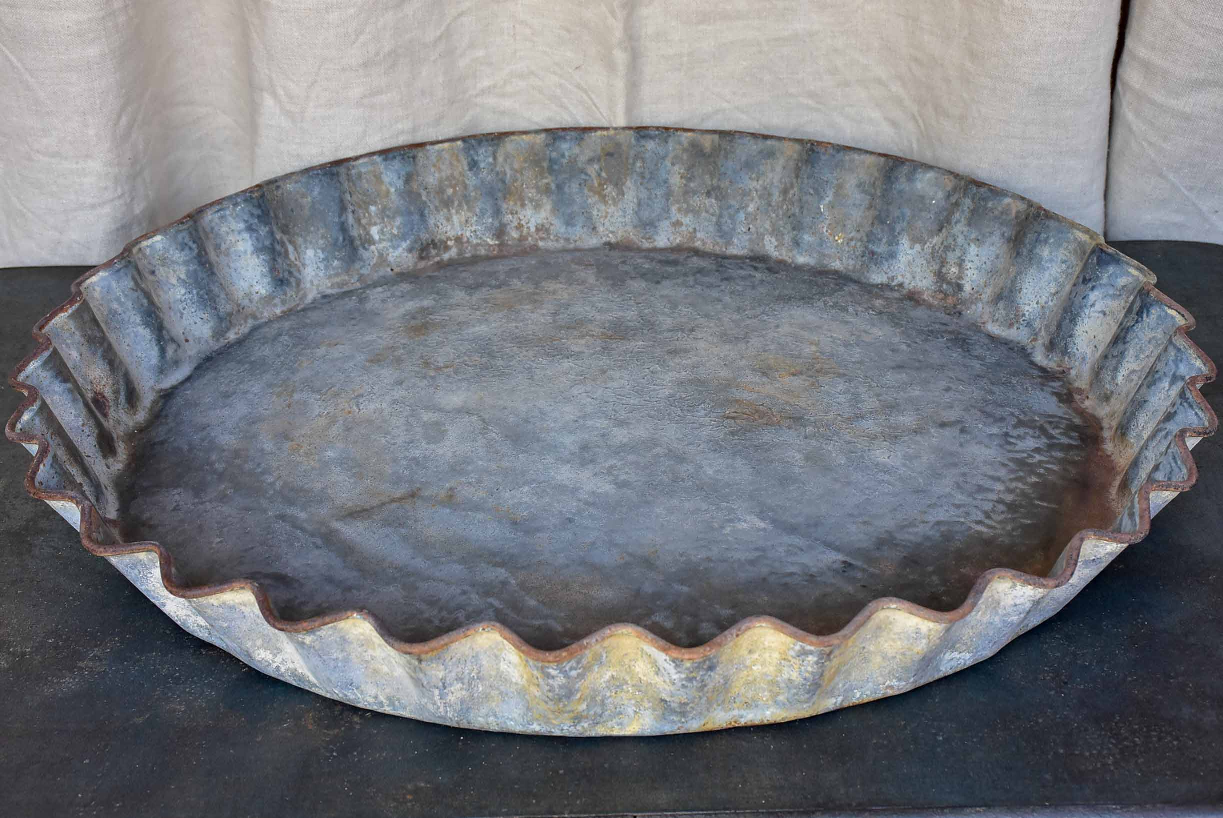 Large antique French zinc dish with rippled edge for harvesting resin