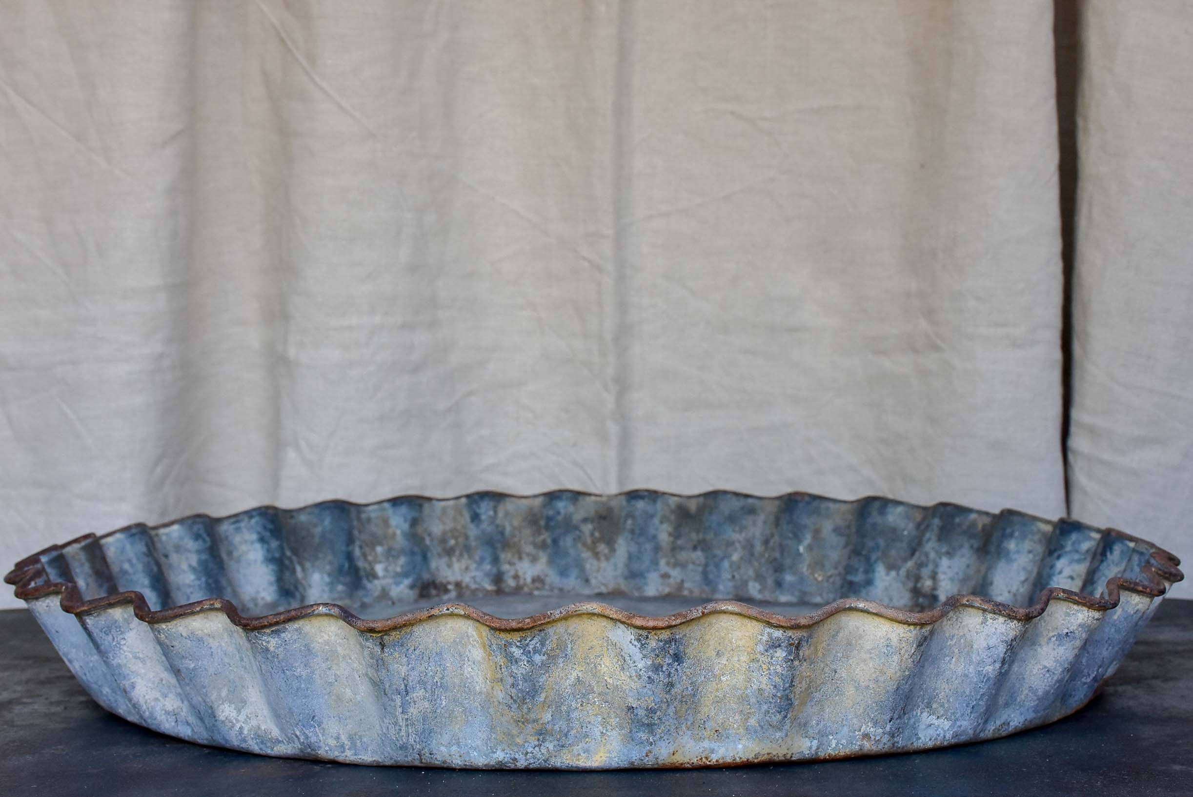 Large antique French zinc dish with rippled edge for harvesting resin