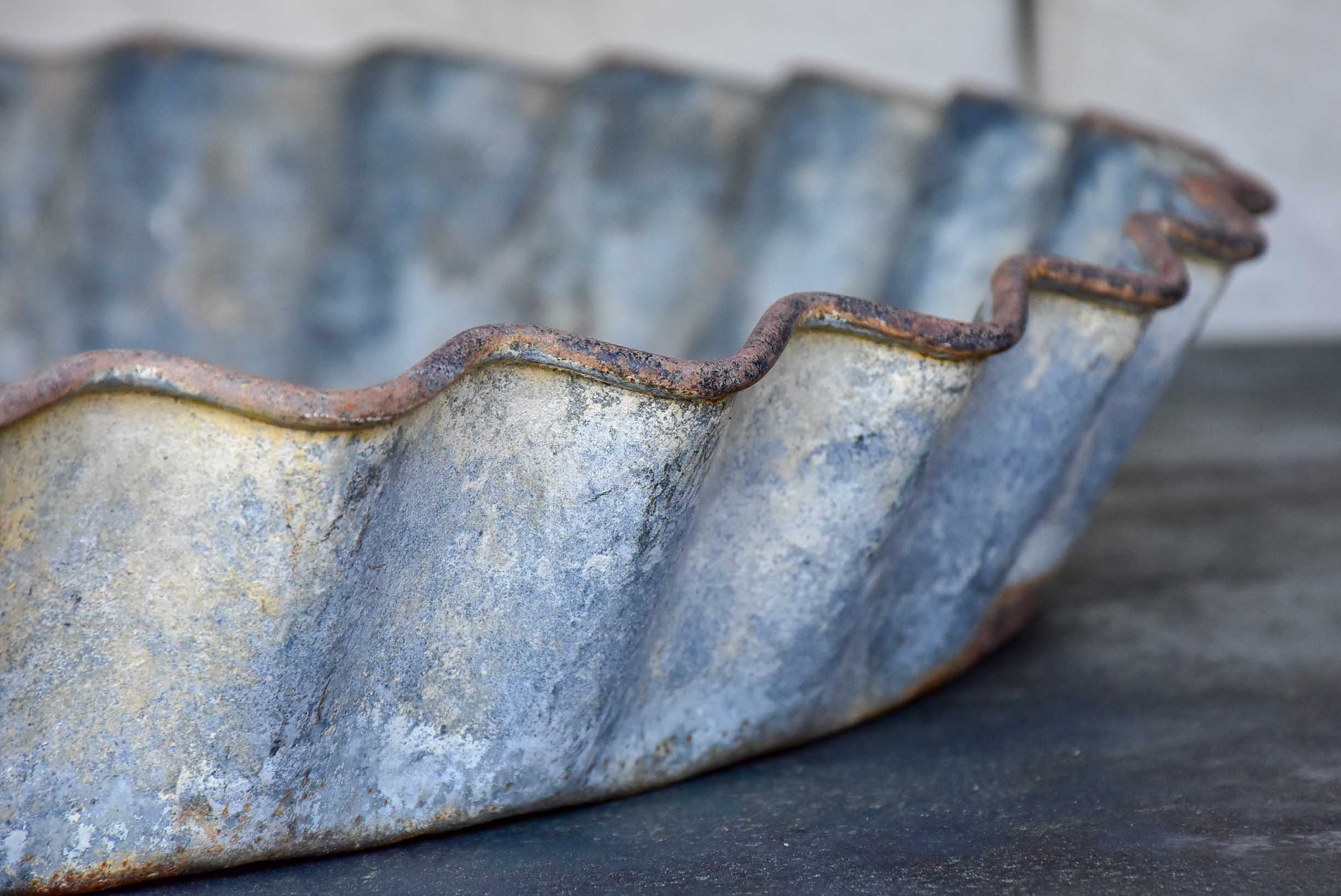 Large antique French zinc dish with rippled edge for harvesting resin