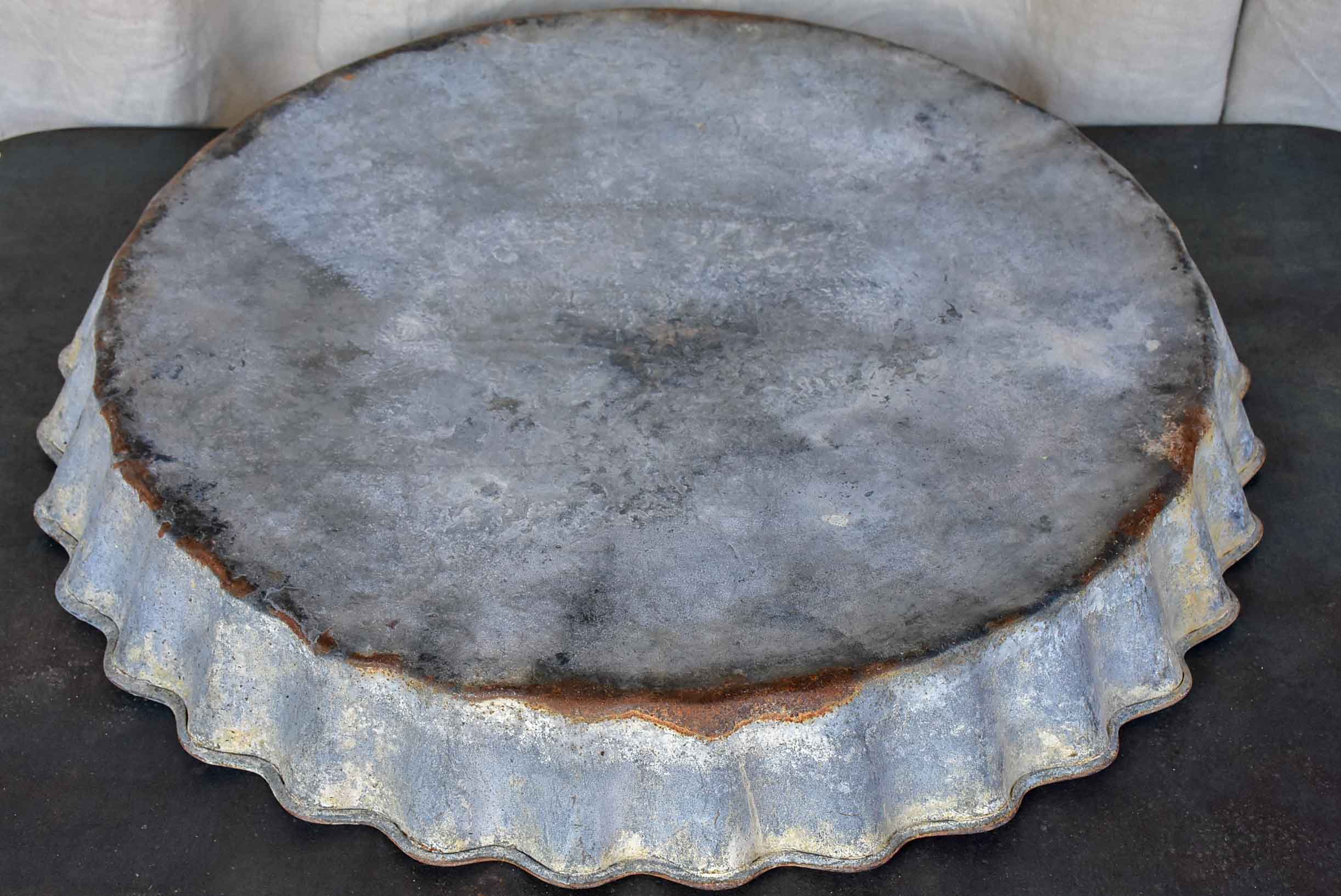 Large antique French zinc dish with rippled edge for harvesting resin