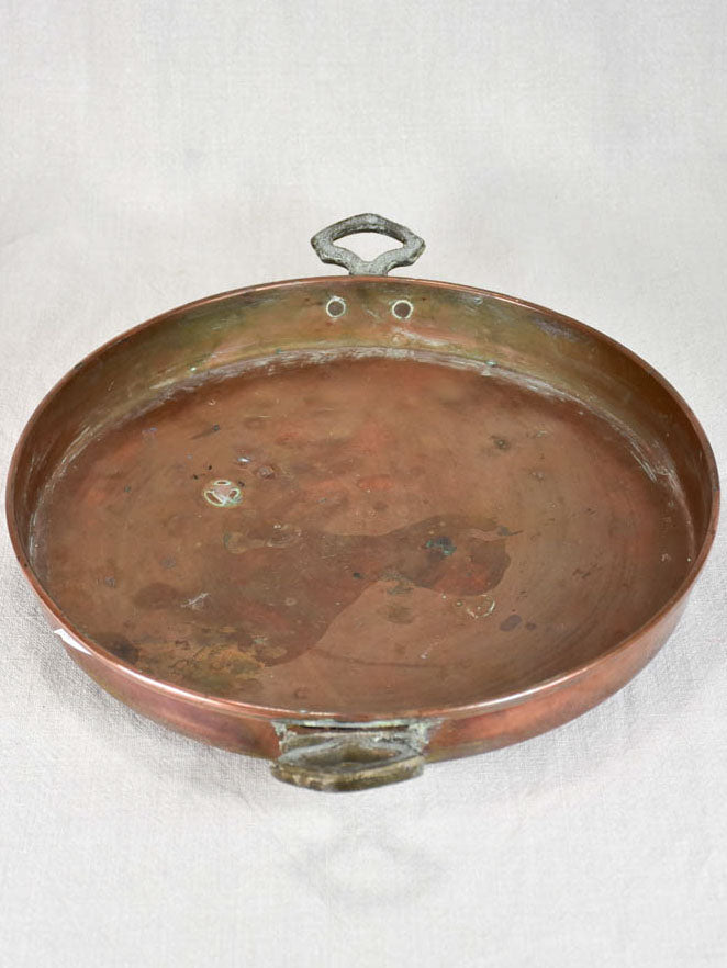 Two late nineteenth-century French copper cooking pots