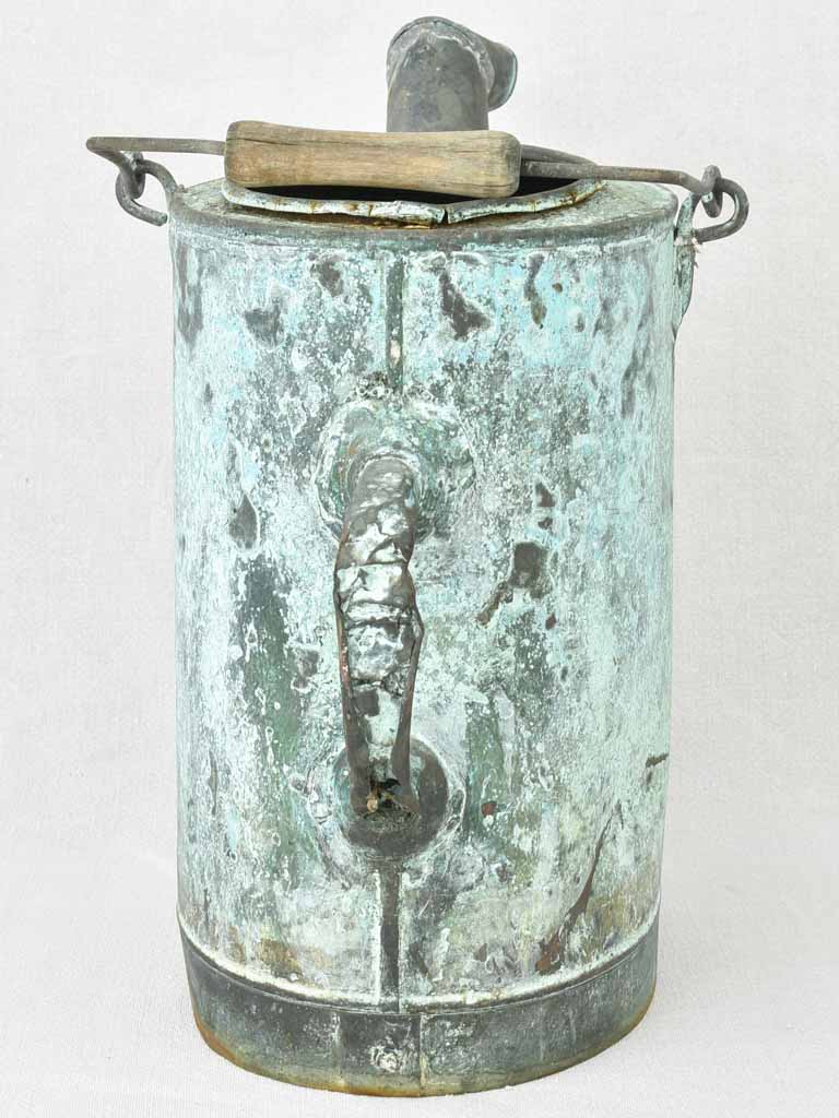 Antique French watering can with blue green atina