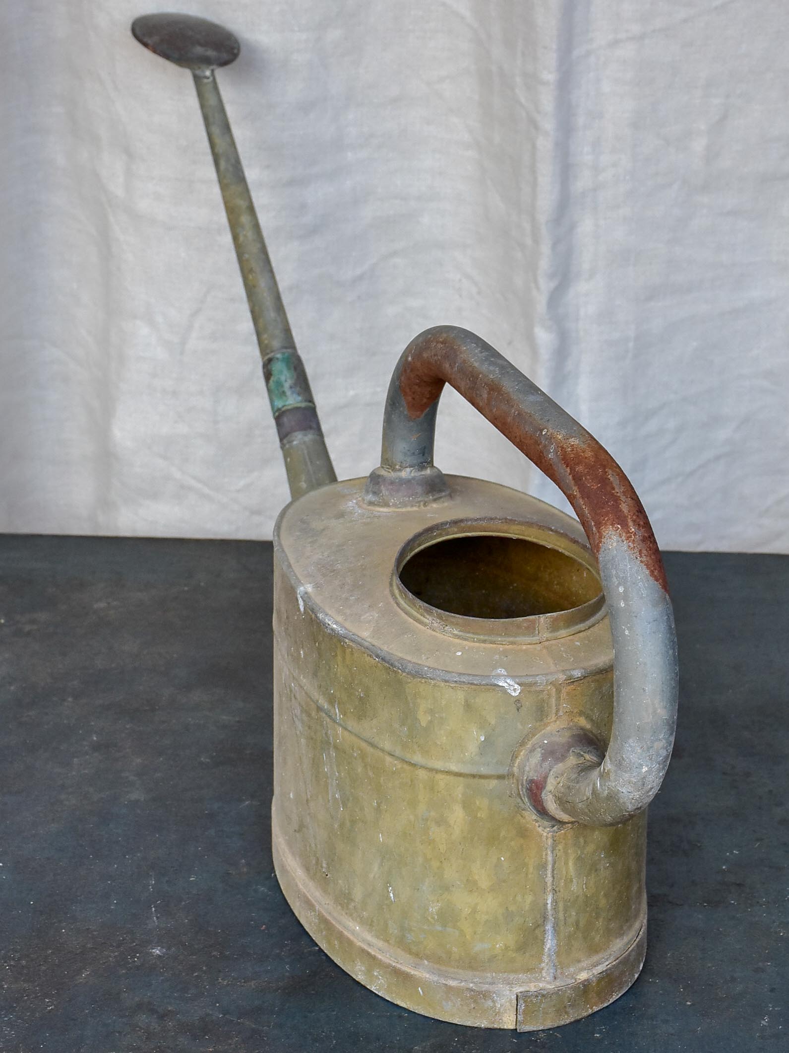 Antique French watering can with long spout