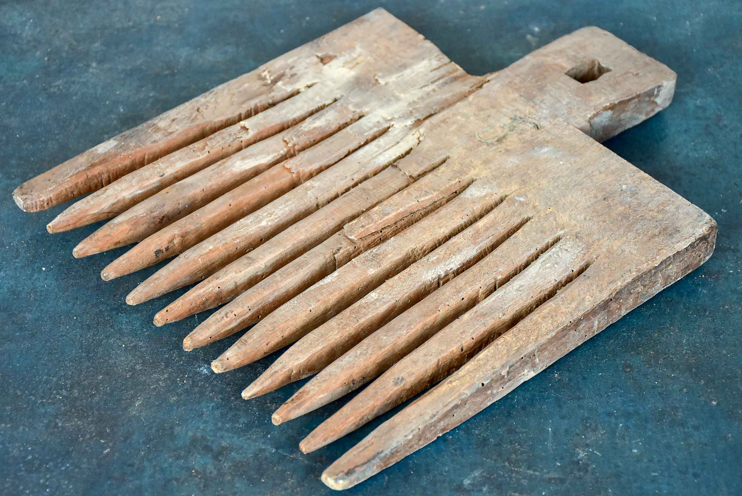 Antique French wooden wool comb