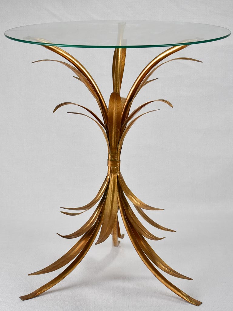 Vintage gold foliage coffee or martini table with glass top