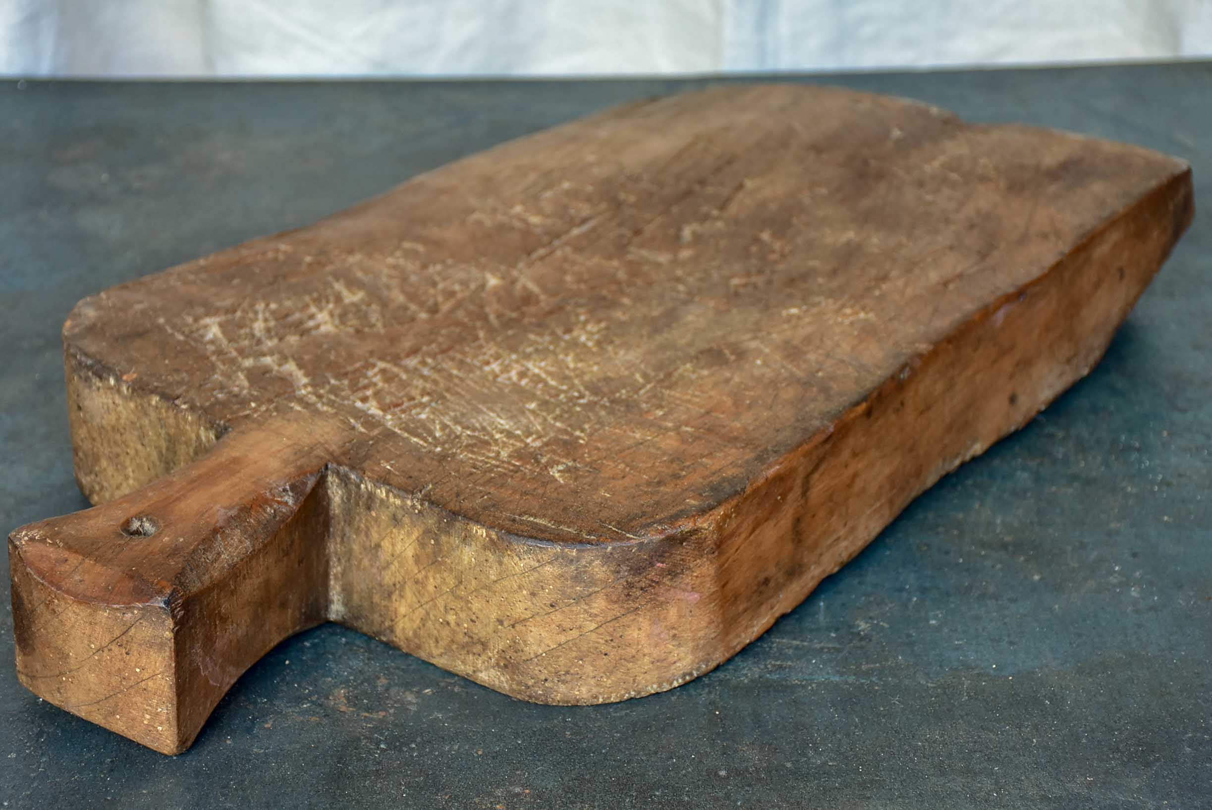 Very thick antique cutting board with curved corners 20”