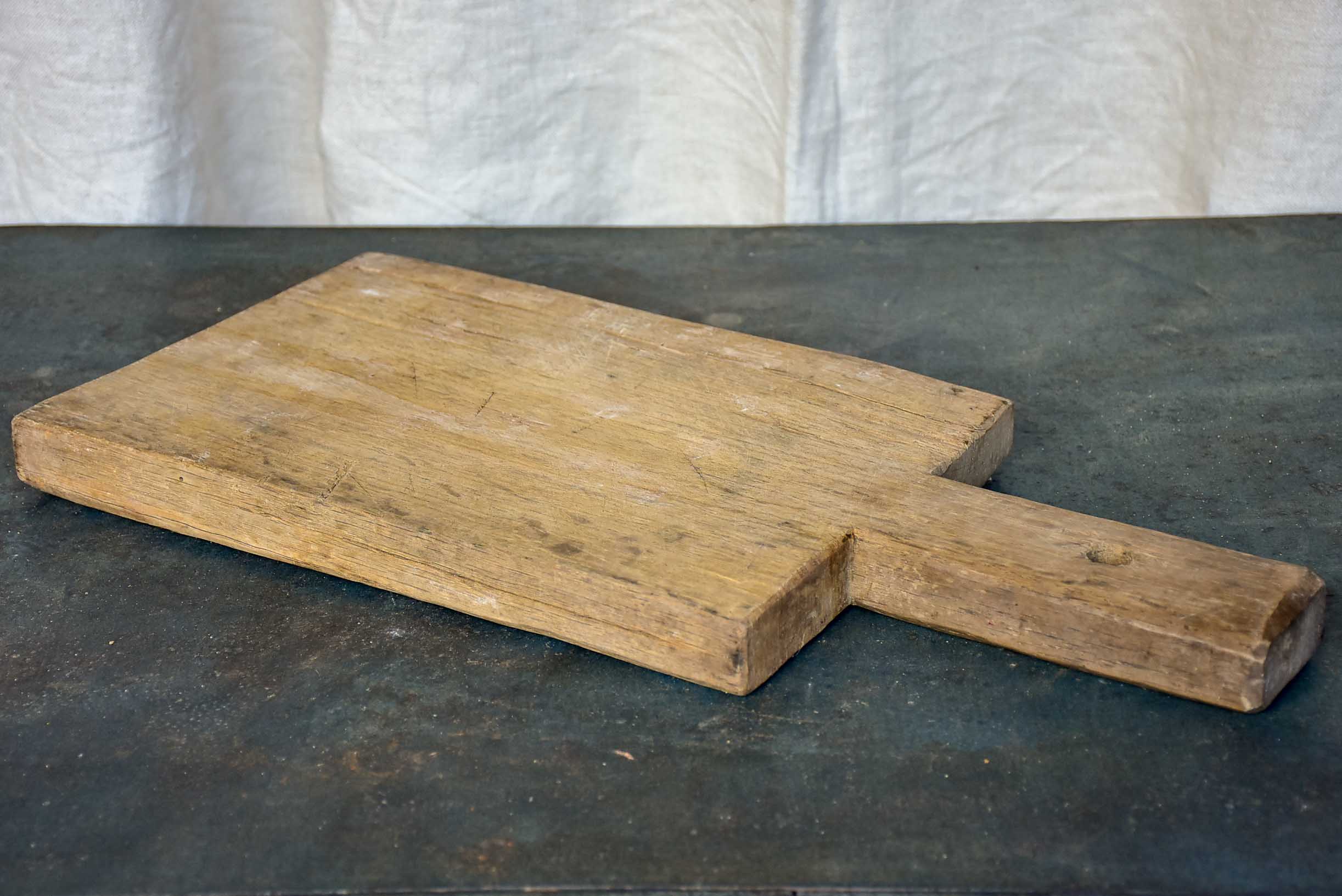 Large antique French cutting board with long handle 21 ¼''