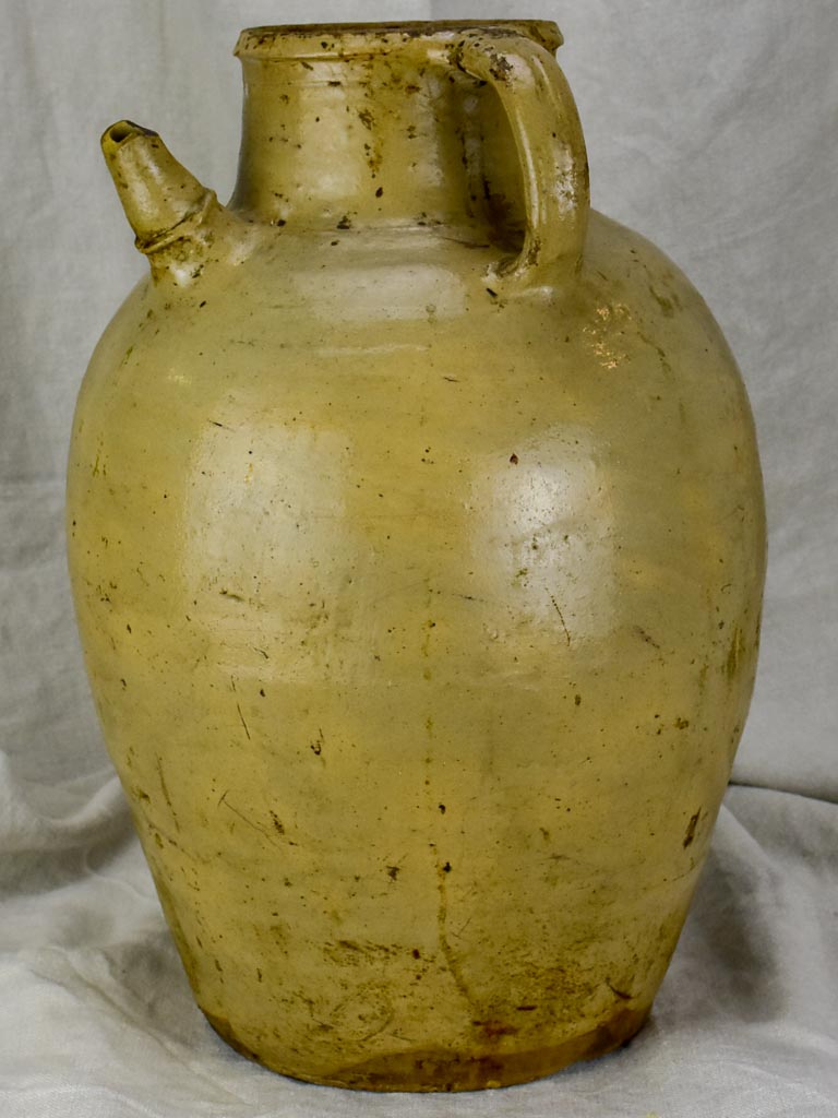 Antique French water flagon from the Auvergne - beige