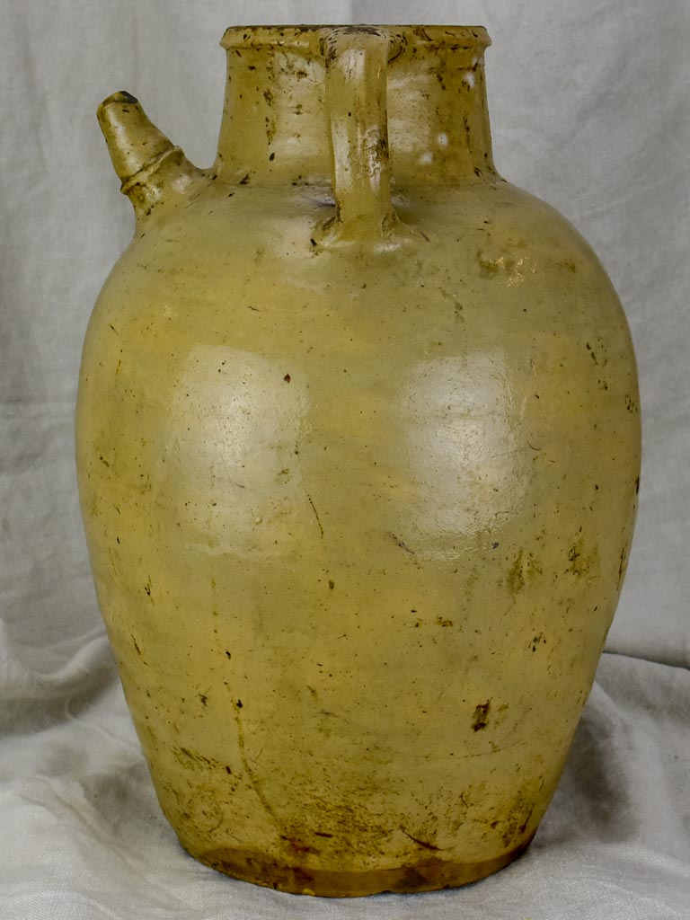 Antique French water flagon from the Auvergne - beige