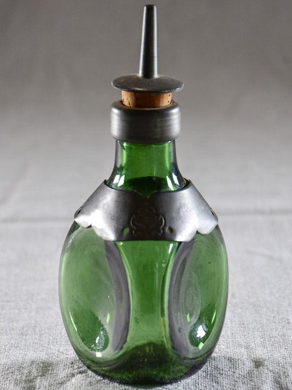 Two aperetif carafes with green glass