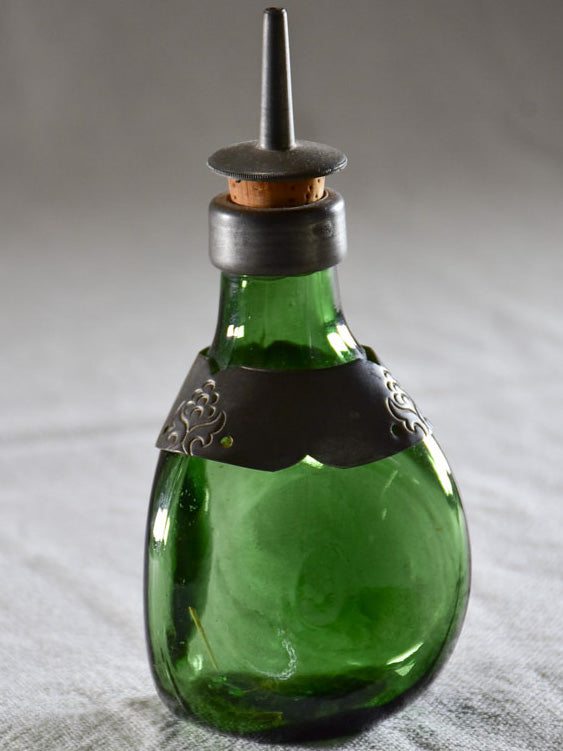 Two aperetif carafes with green glass