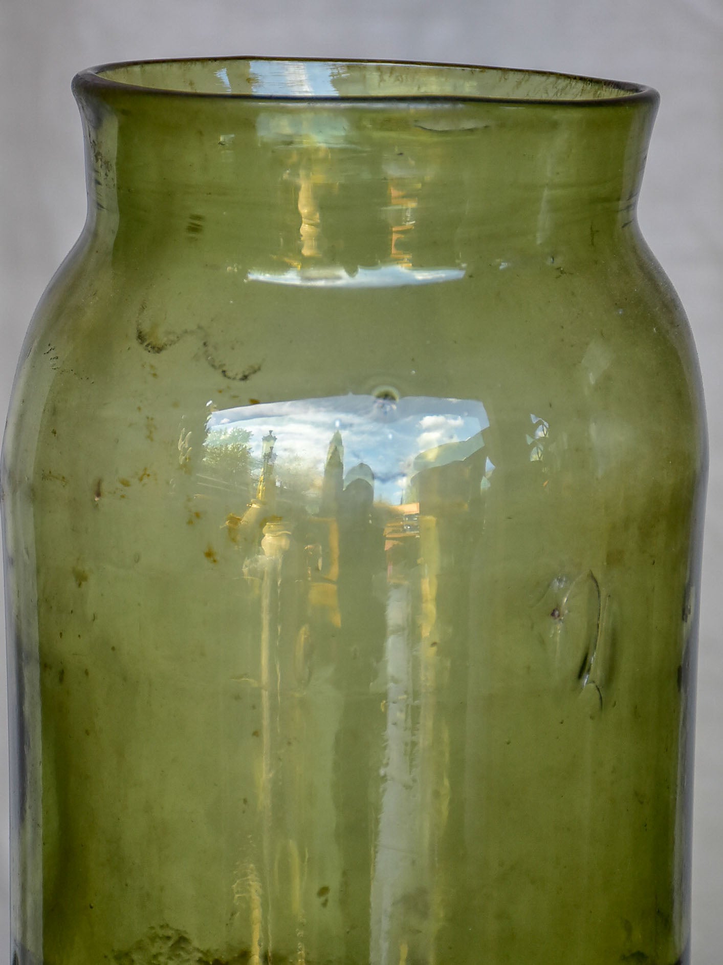 A pair of large late 19th Century green glass jars