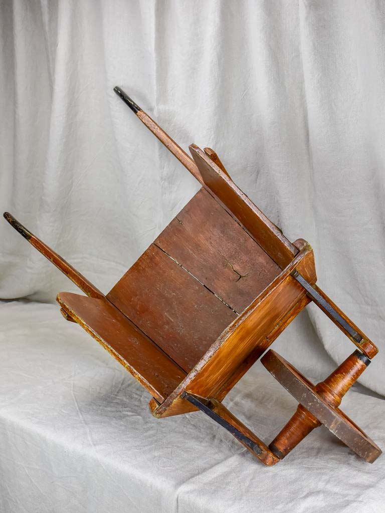 Antique French wooden wheelbarrow