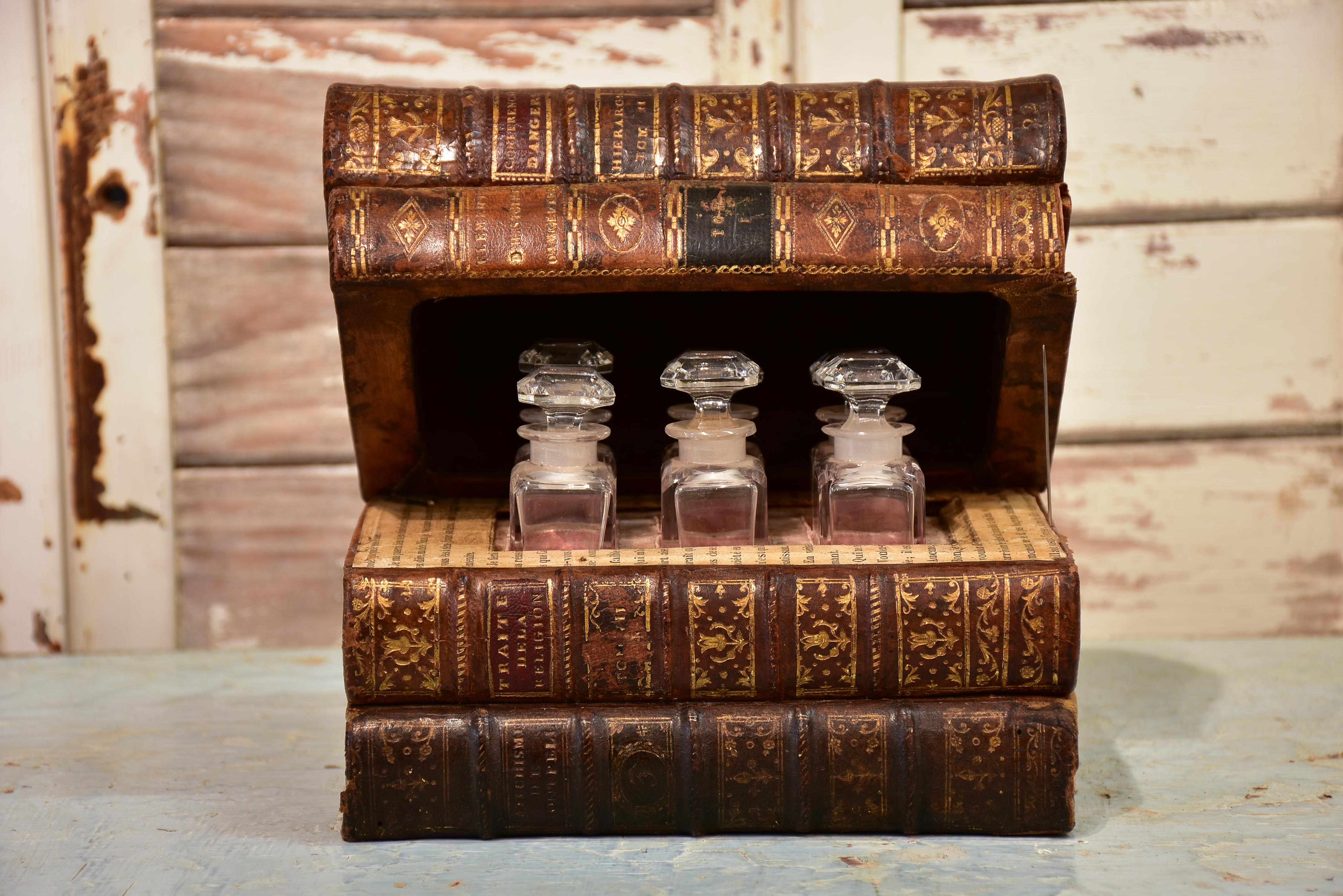 Antique French secret storage box with six perfume flasks