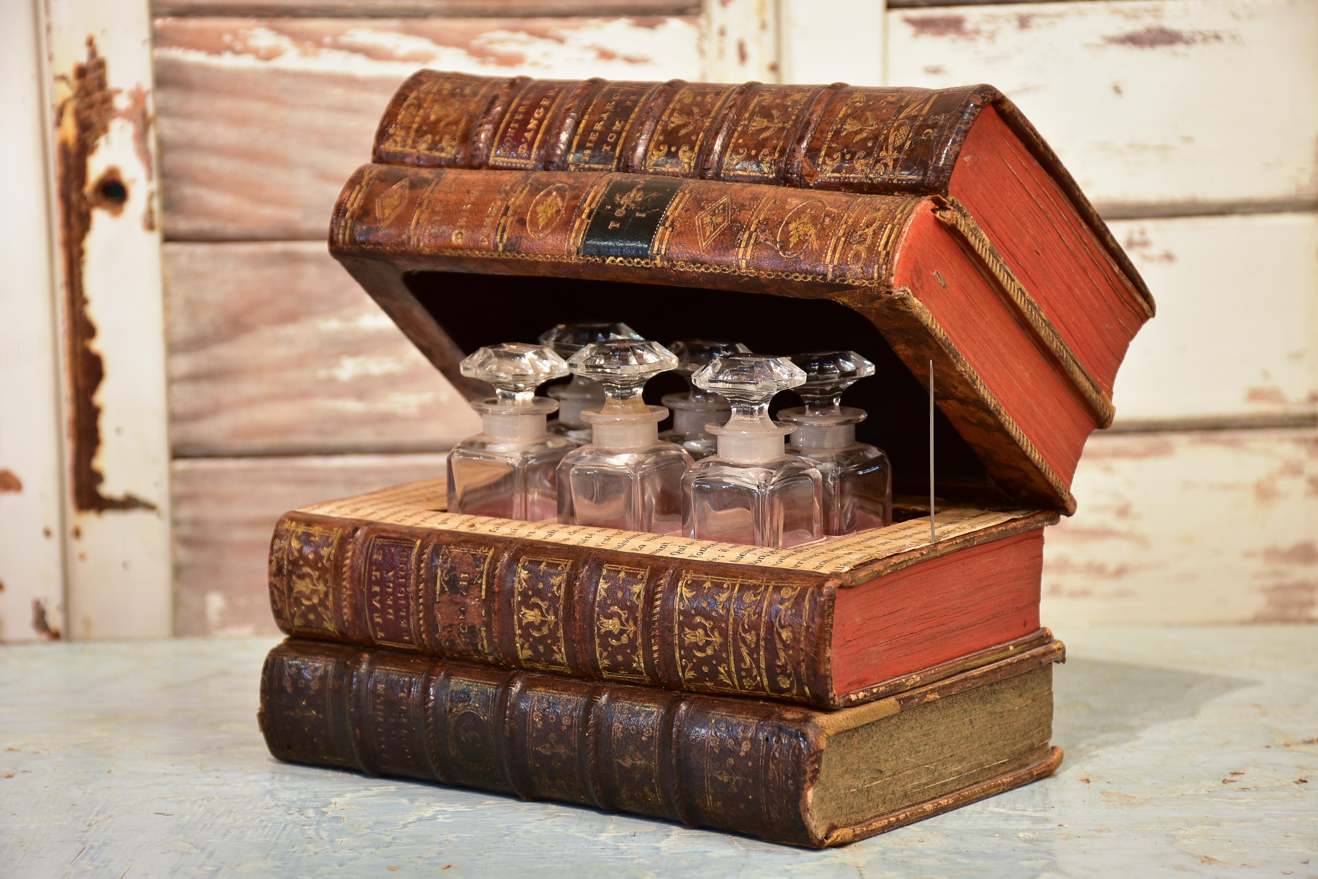 Antique French secret storage box with six perfume flasks