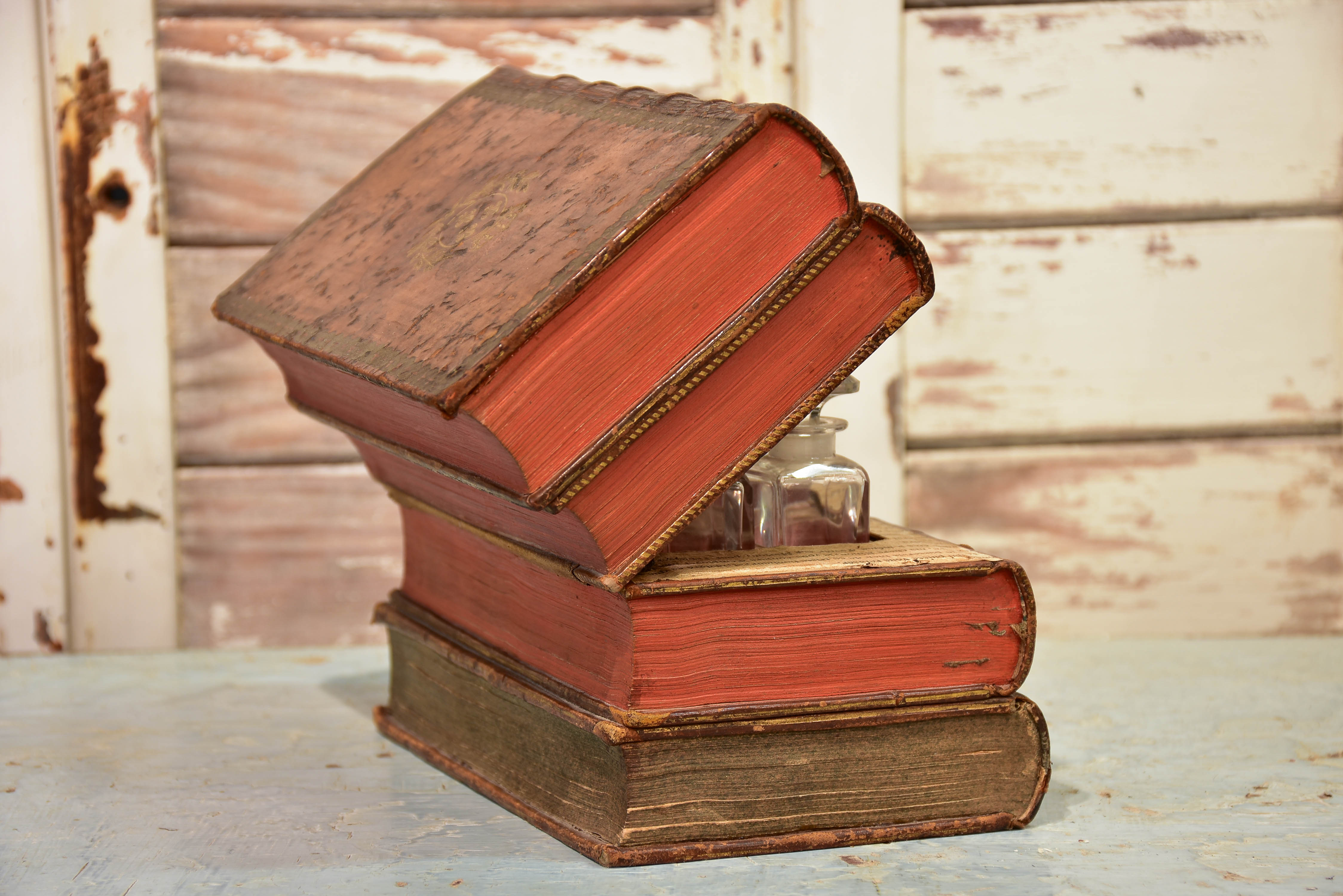 Antique French secret storage box with six perfume flasks