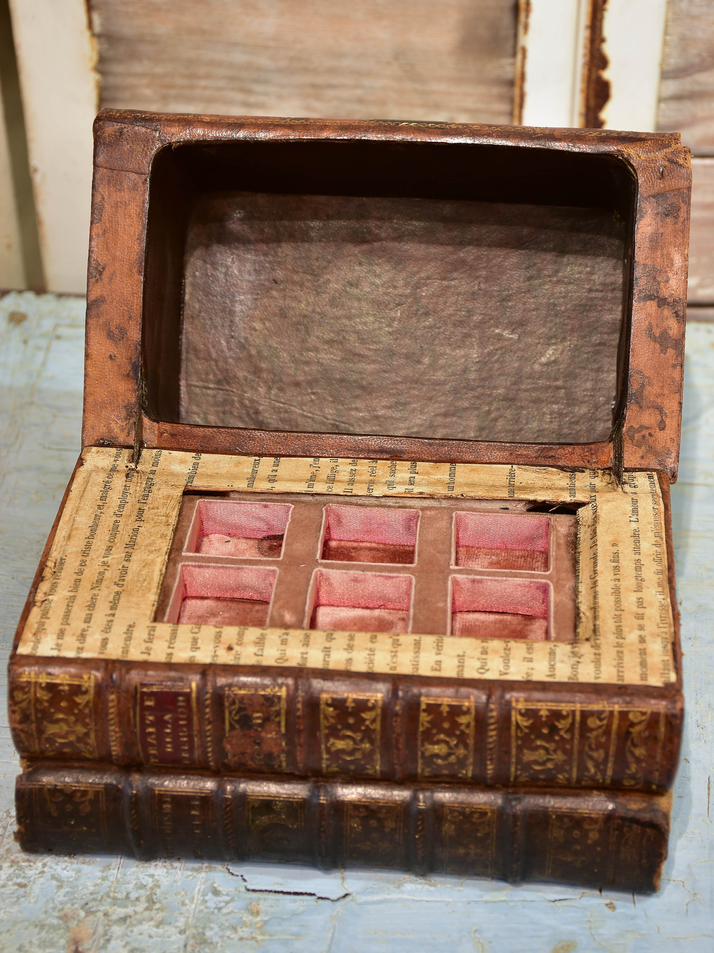 Antique French secret storage box with six perfume flasks