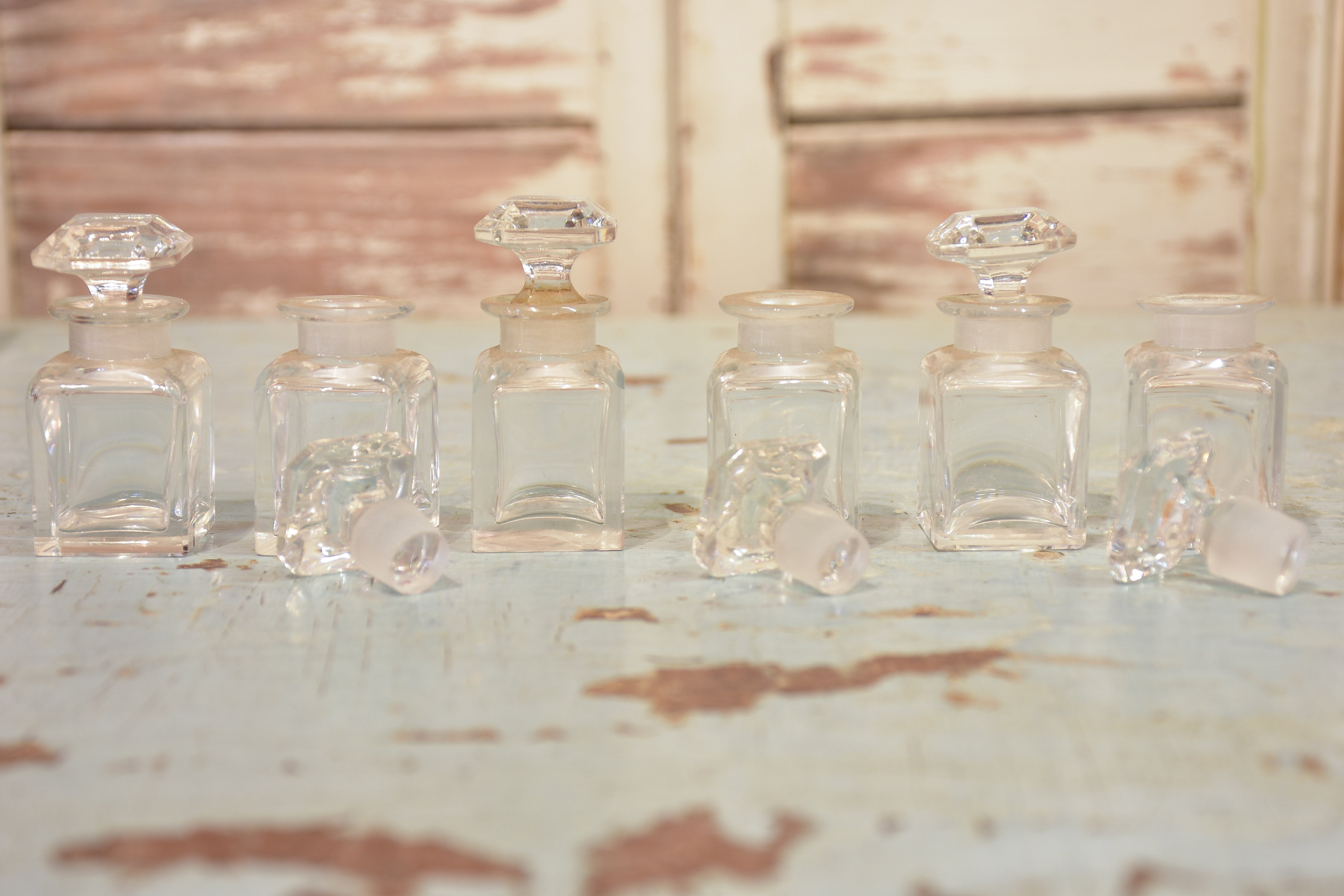 Antique French secret storage box with six perfume flasks