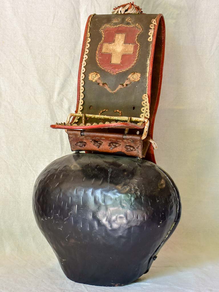 Antique Swisse cowbell with leather strap