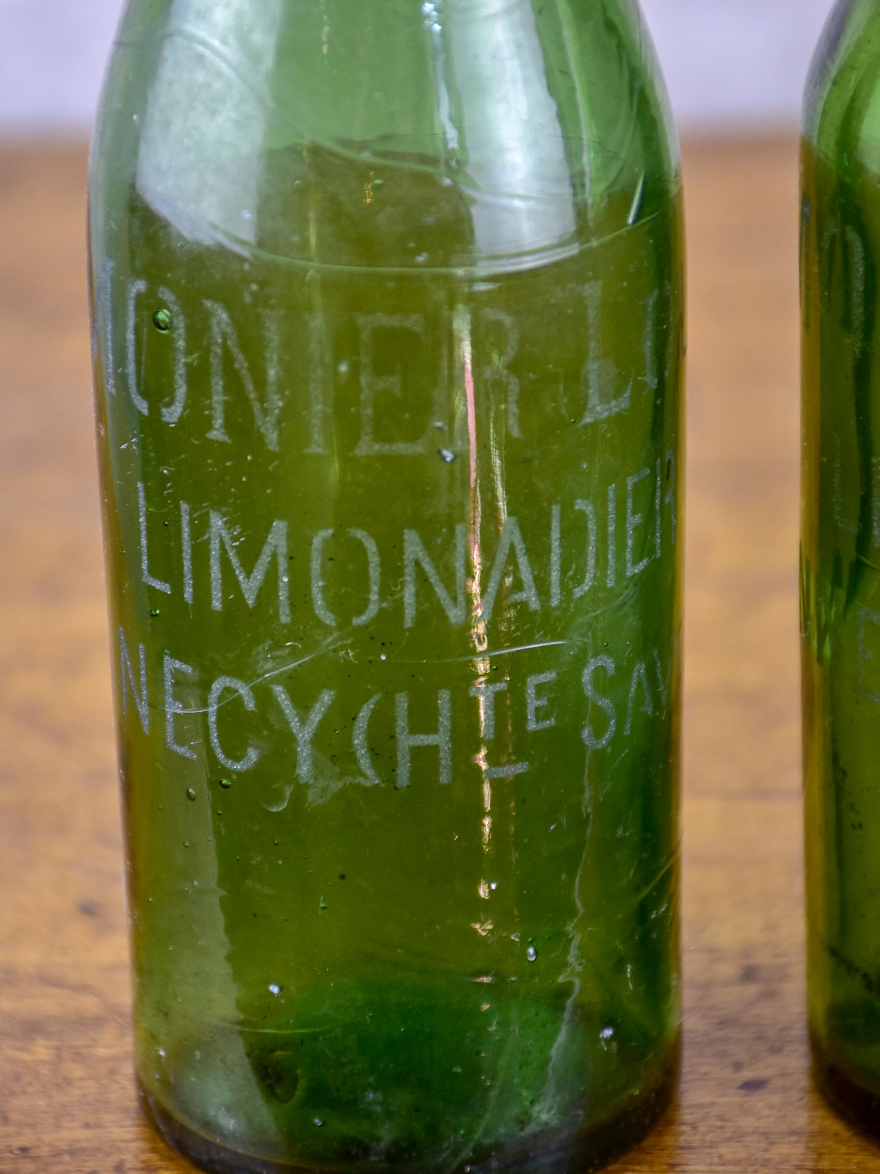 17 antique French lemonade bottles with ceramic stoppers