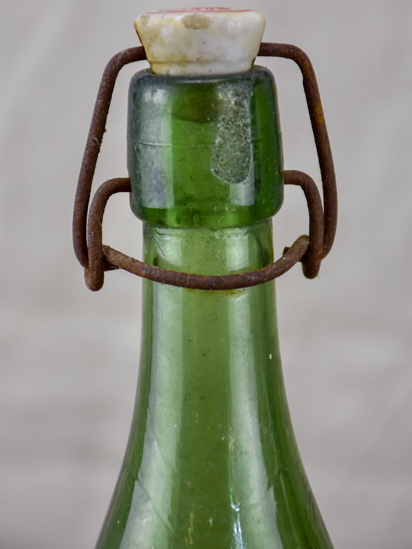 17 antique French lemonade bottles with ceramic stoppers