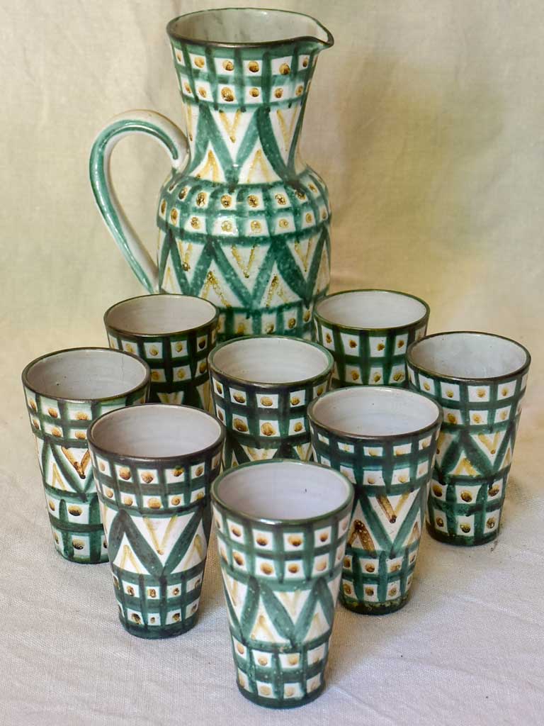 Eight mid century French ceramic Robert Picault juice cups and pitcher