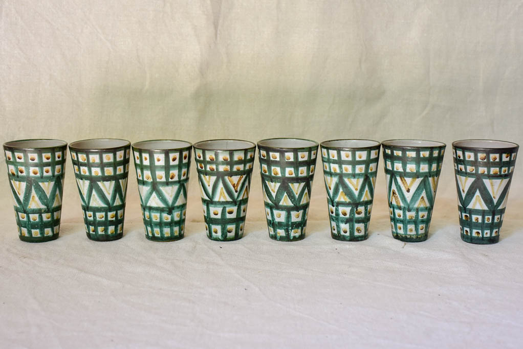 Eight mid century French ceramic Robert Picault juice cups and pitcher