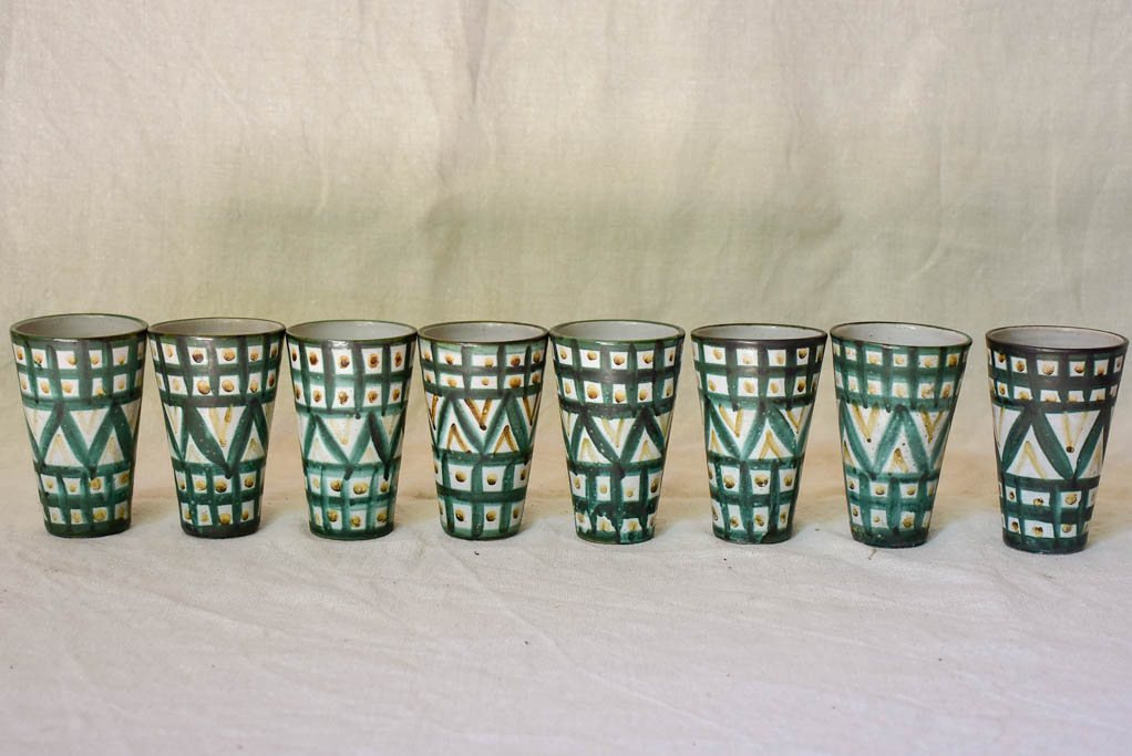 Eight mid century French ceramic Robert Picault juice cups and pitcher