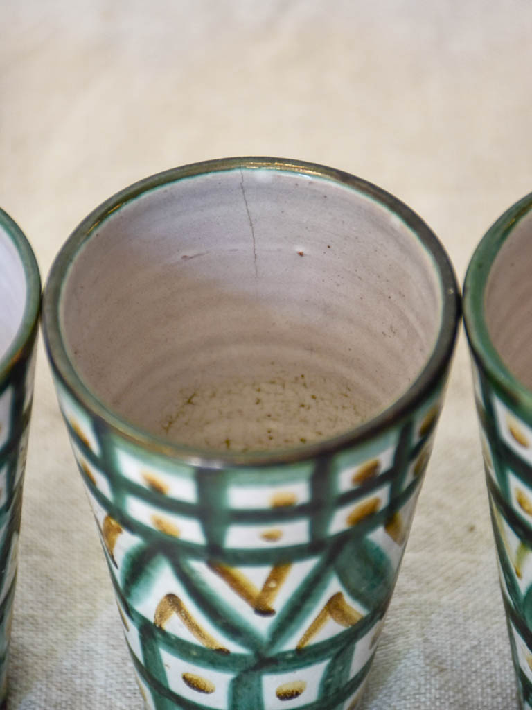 Eight mid century French ceramic Robert Picault juice cups and pitcher