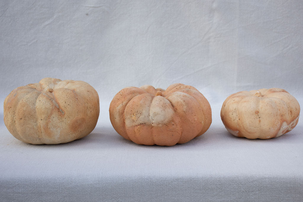 Collection of six terracotta pumpkin decorations