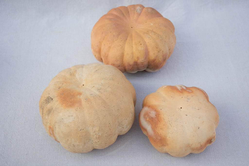 Collection of six terracotta pumpkin decorations