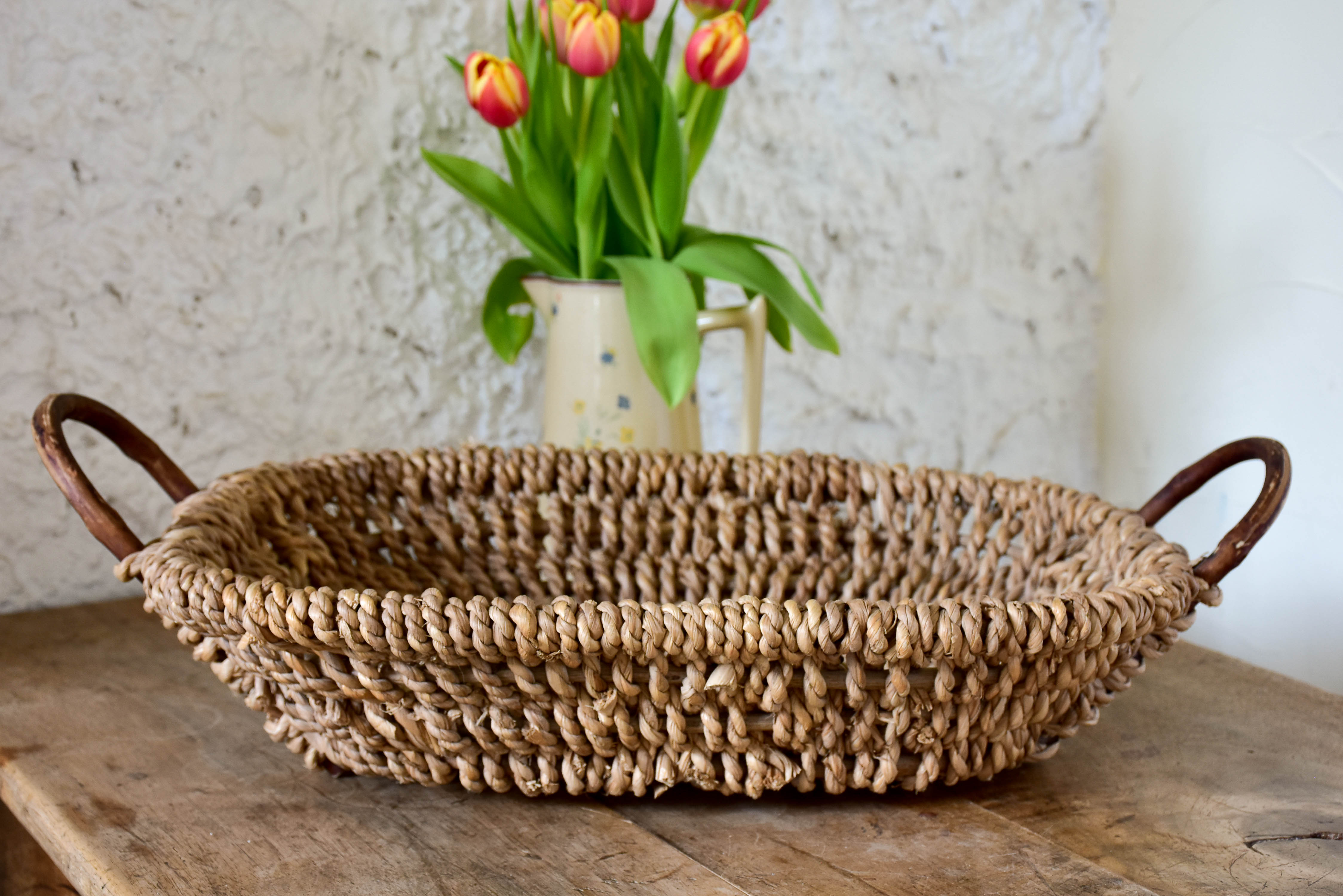 Woven French basket tray with cane handles