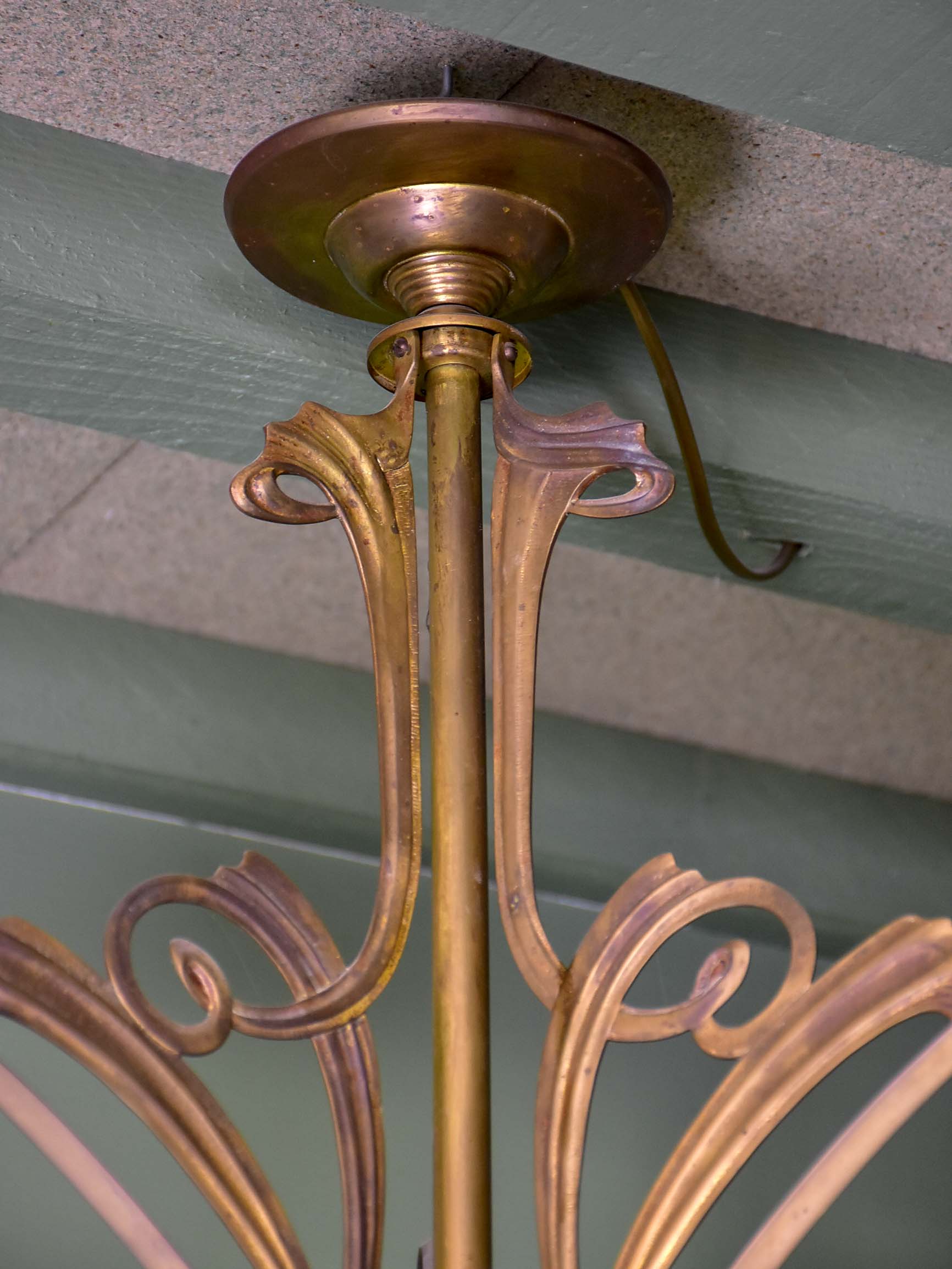 French Art Nouveau three light pendant with green glass lampshades