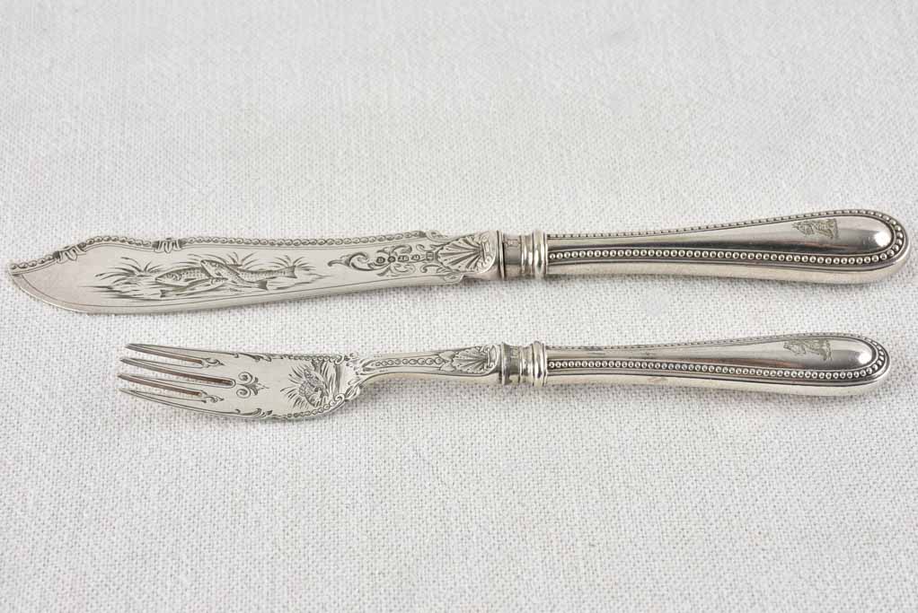 Late nineteenth-century decorated seafood flatware