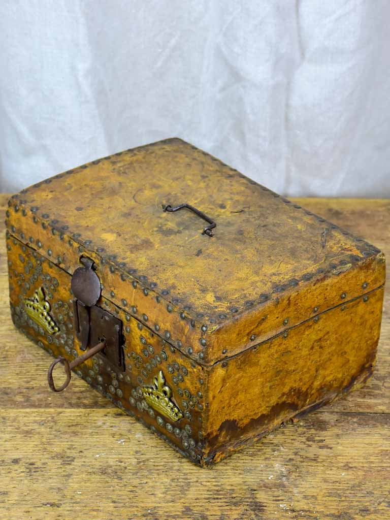 17th Century leather and wooden storage chest with key