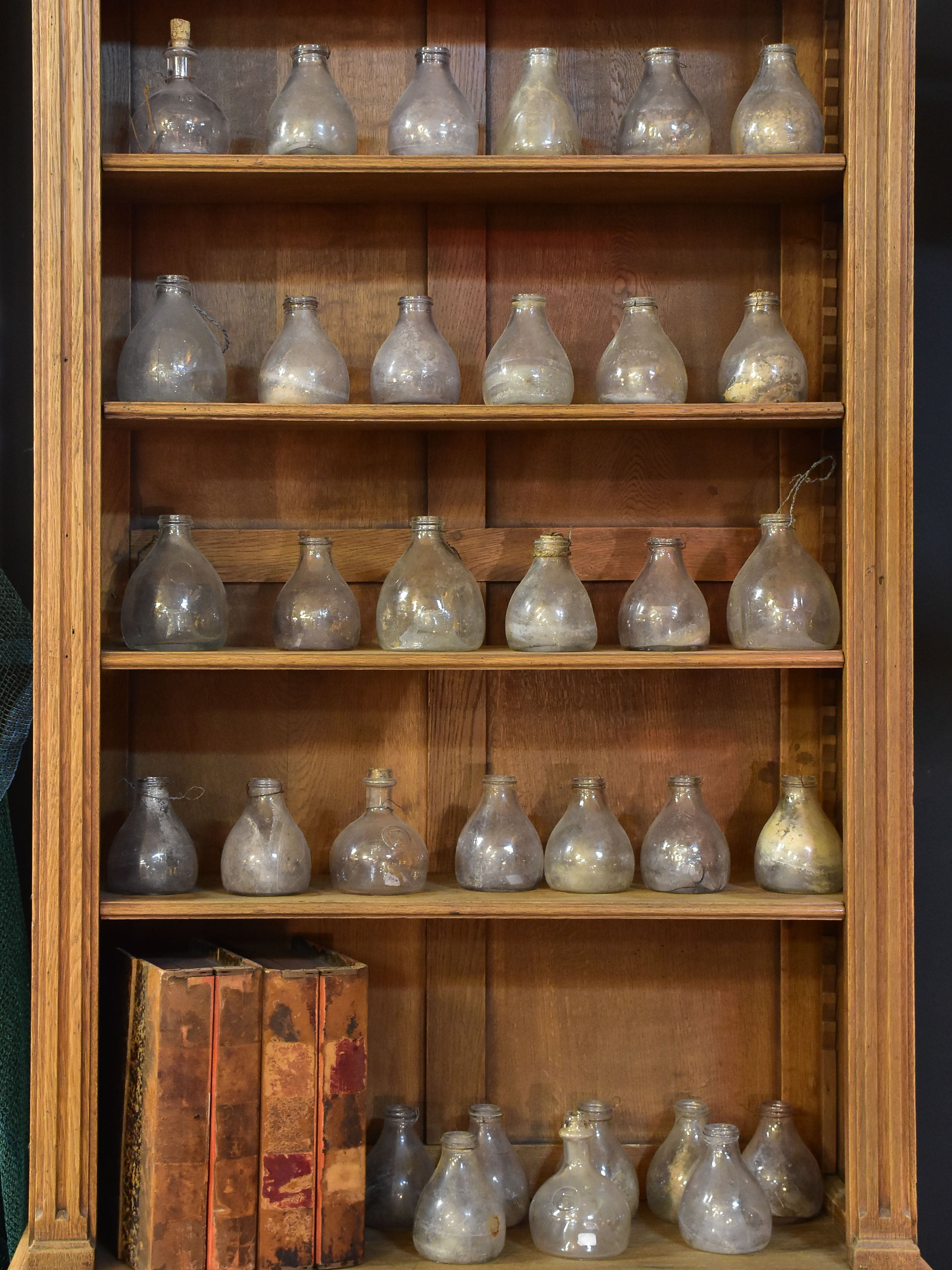 Collection of antique French fly trap bottles