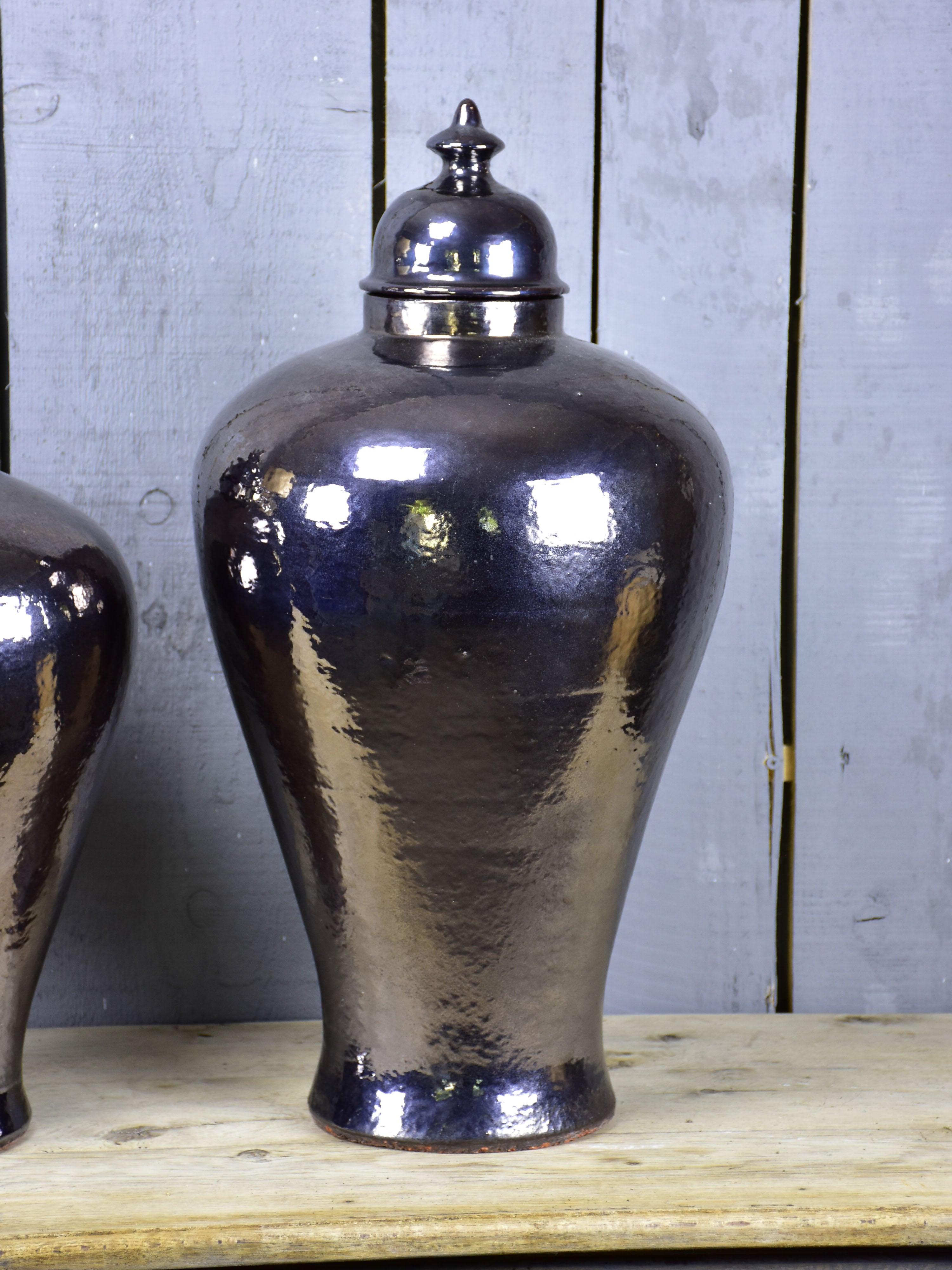 Three very large urns with enamel varnish