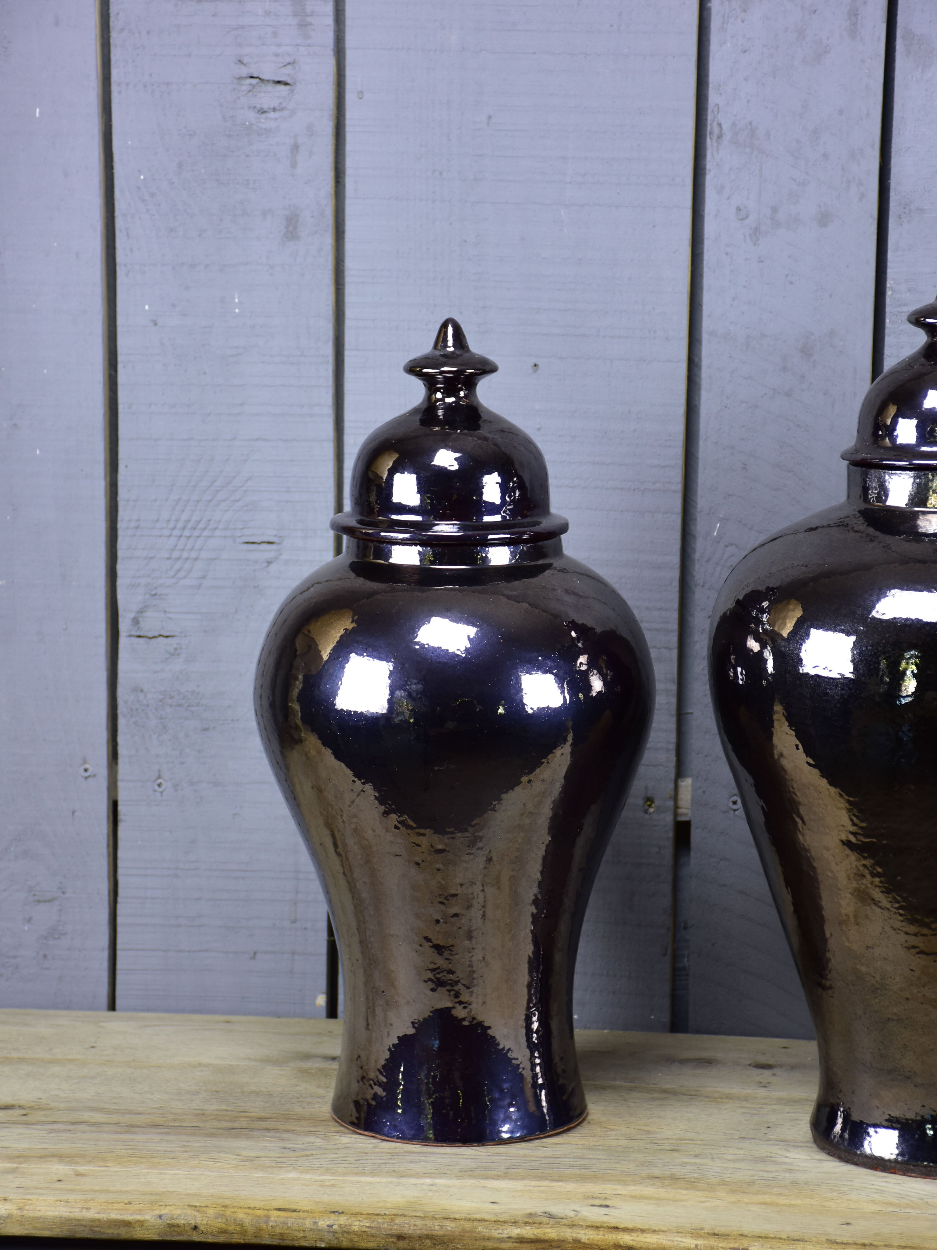 Three very large urns with enamel varnish