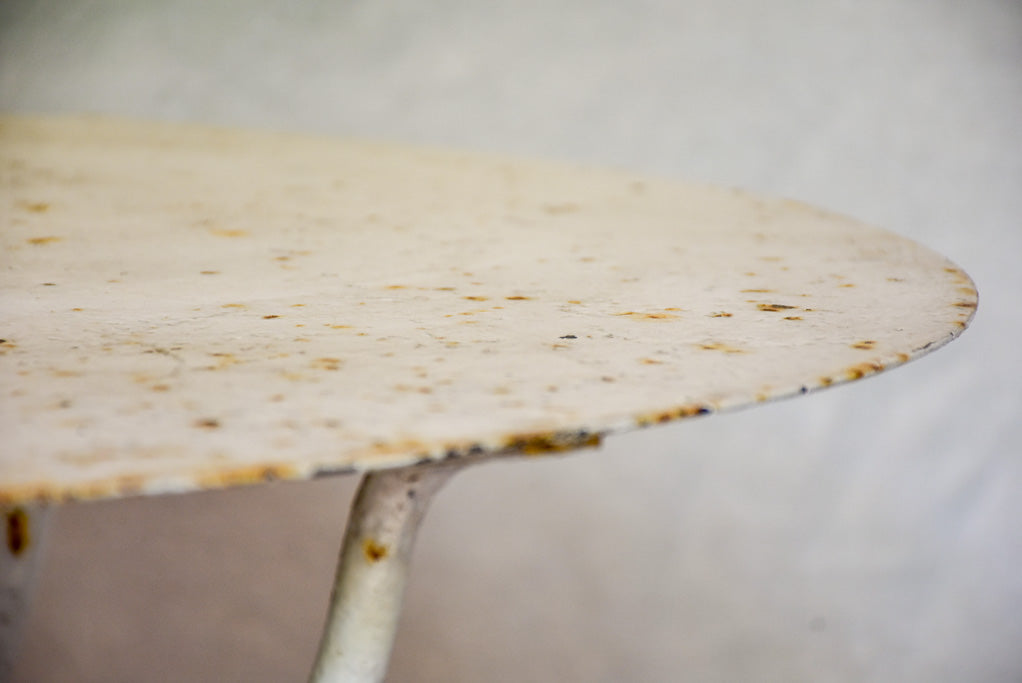 Early 20th Century French garden table with white patina