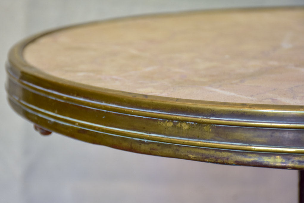 Early 20th-century bistro table with marble top and cast iron base