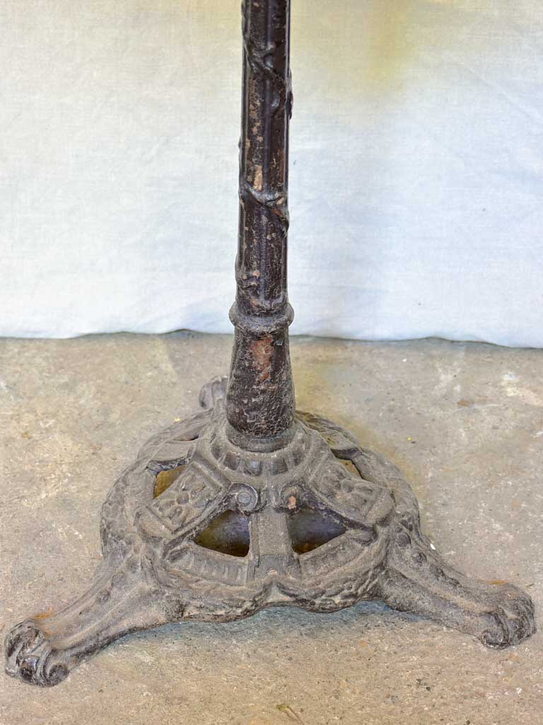 Early 20th-century bistro table with marble top and cast iron base