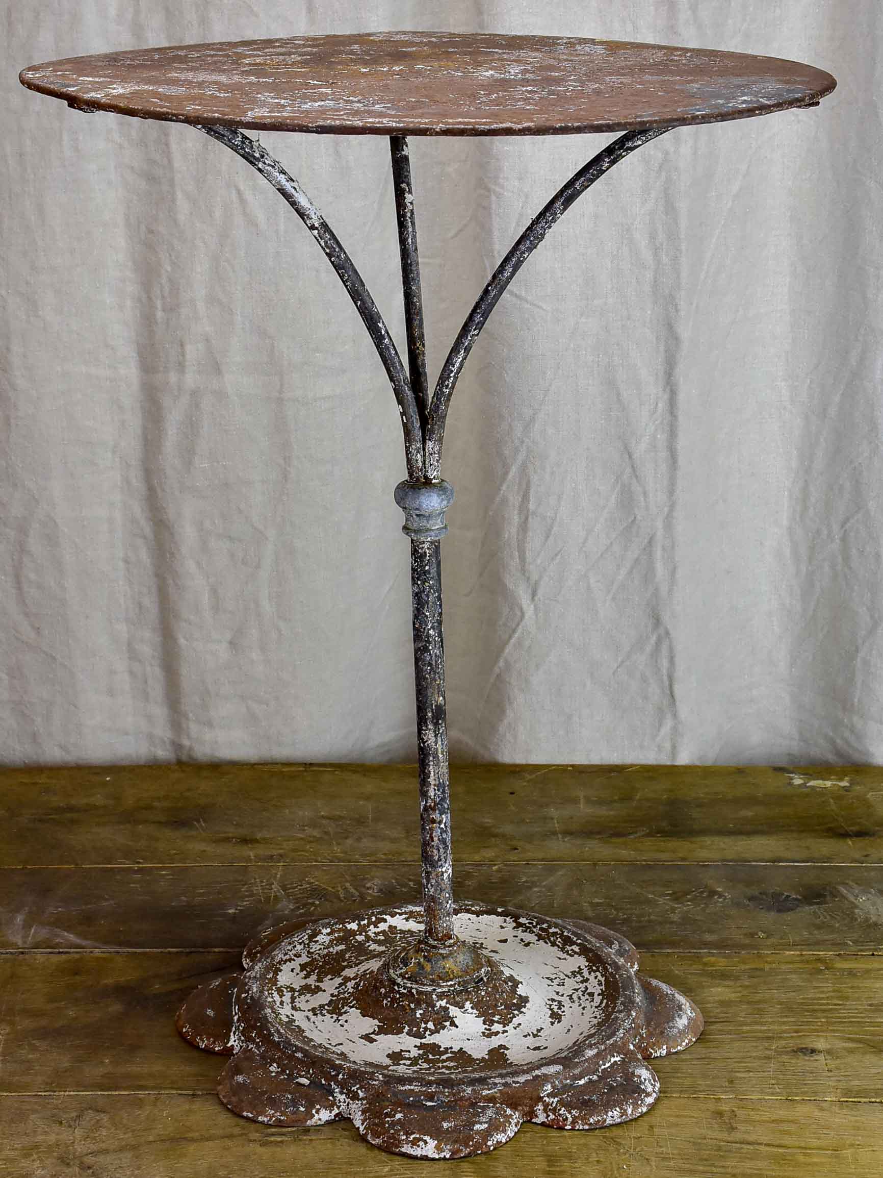 Antique French garden table with daisy base